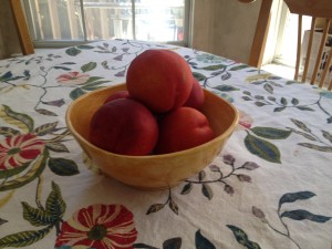 Technically these are nectarines, the fuzz-free peach. Though fuzzless, these are still great in the cobbler. They also make a good still life subject.