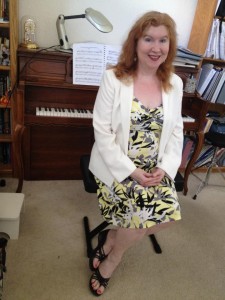 Marilyn in yellow dress at piano